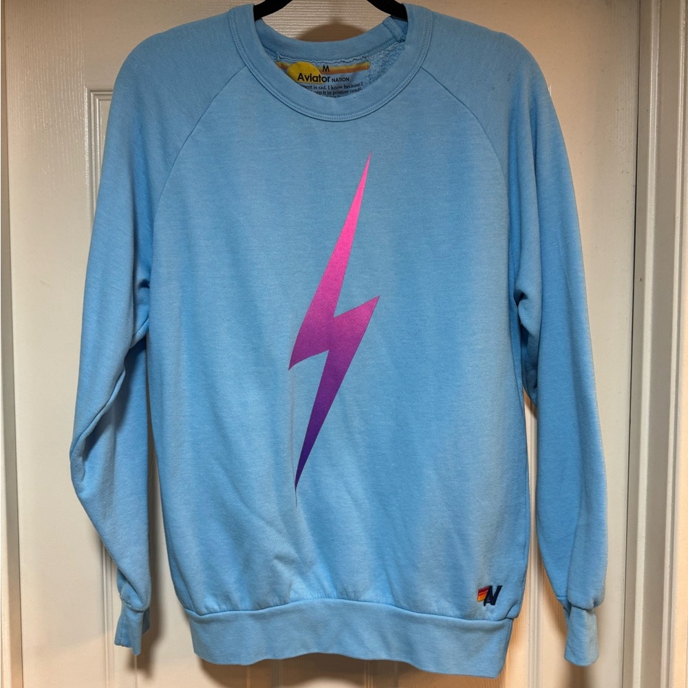 Aviator Nation Light Blue Sweater with Purple Lightning Bolt